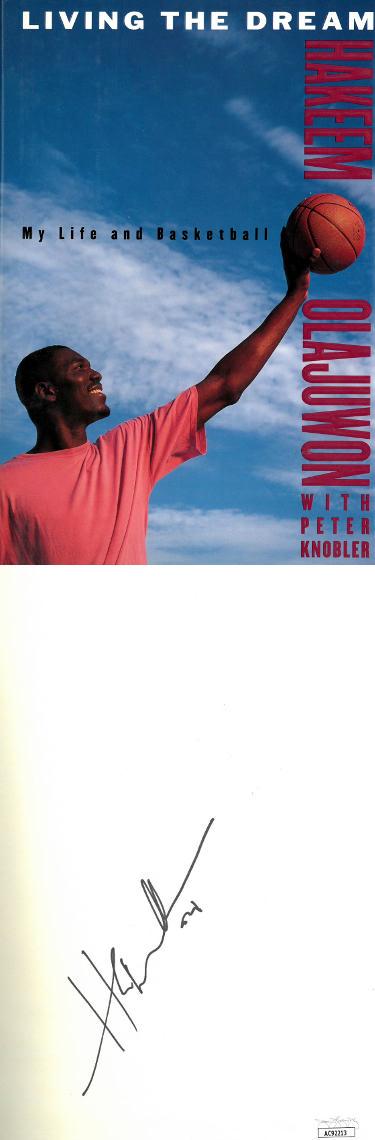Hakeem Olajuwon signed 1996 Living The Dream 1st Edition Hard Cover Book- JSA #AC92213