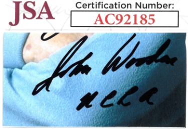 John Wooden signed 2.5x1.25 Cut Signature INSC- JSA #AC92185 (UCLA Bruins)