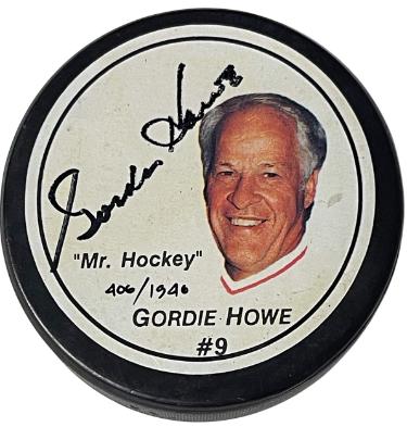 Gordie Howe signed Mr. Hockey #9 Logo Puck- /1946 imperfect- COA