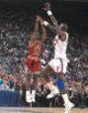 Craig Hodges signed Chicago Bulls 8x10 Photo vs New York Knicks (3X 3 Point Shooting Contest Winner)