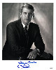 Oliver North signed 1990 B&W 8x10 Photo Many Thanks- JSA Hologram #EE41588 (USMC Lt Col/National Security Council)