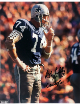 Bob Lilly has hand signed this Dallas Cowboys NFL Licensed 8x10 Photo #74- CSA COA/Show Ticket