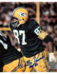 Willie Davis has hand signed this Green Bay Packers NFL Licensed 8x10 Photo HOF 81 minor dings- COA